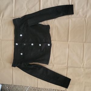 Jacket designed in the USA. Tag has size and color style and name of brand